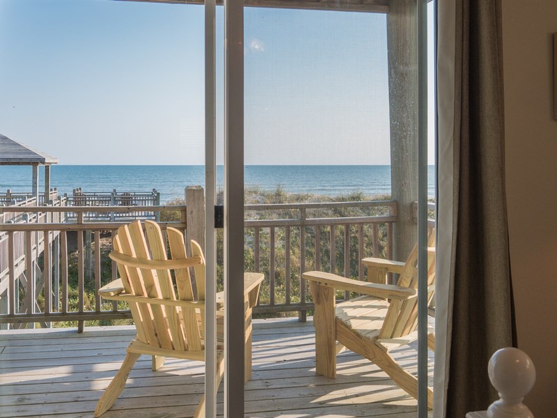 Oceanfront deck access from the guest bedroom