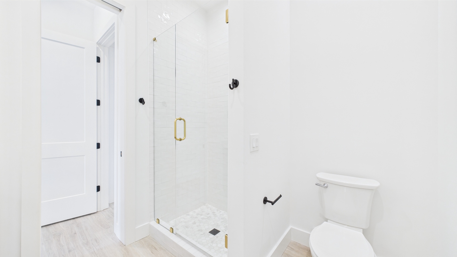 Master bathroom with dual vanity and walk in shower