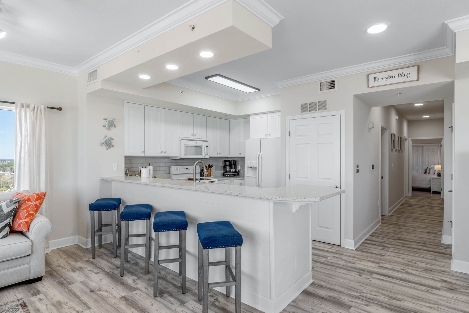 Kitchen area with bar seating