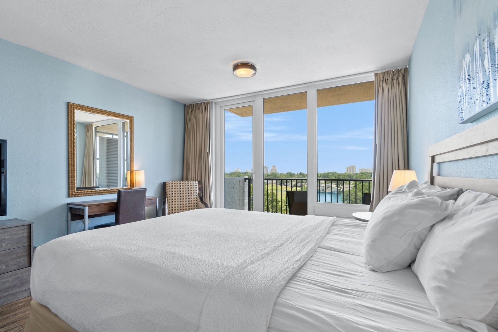 Two Queen beds with balcony access