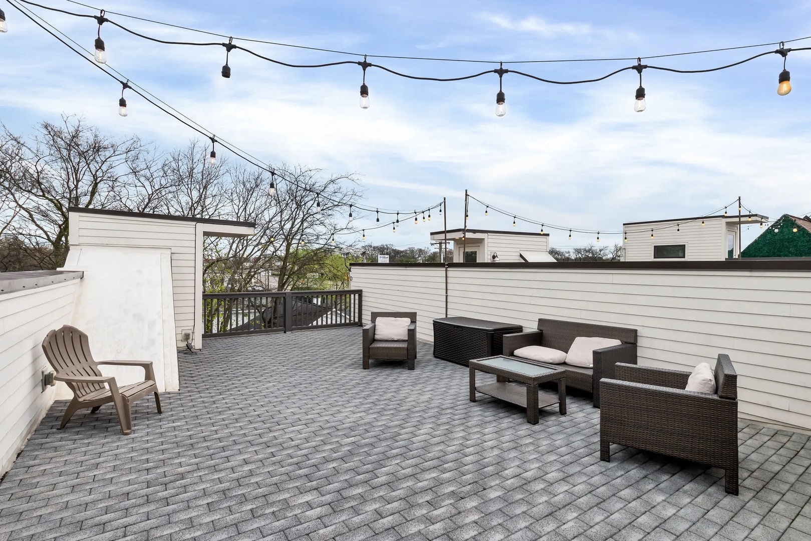Private rooftop terrace with comfortable furnishings and scenic views