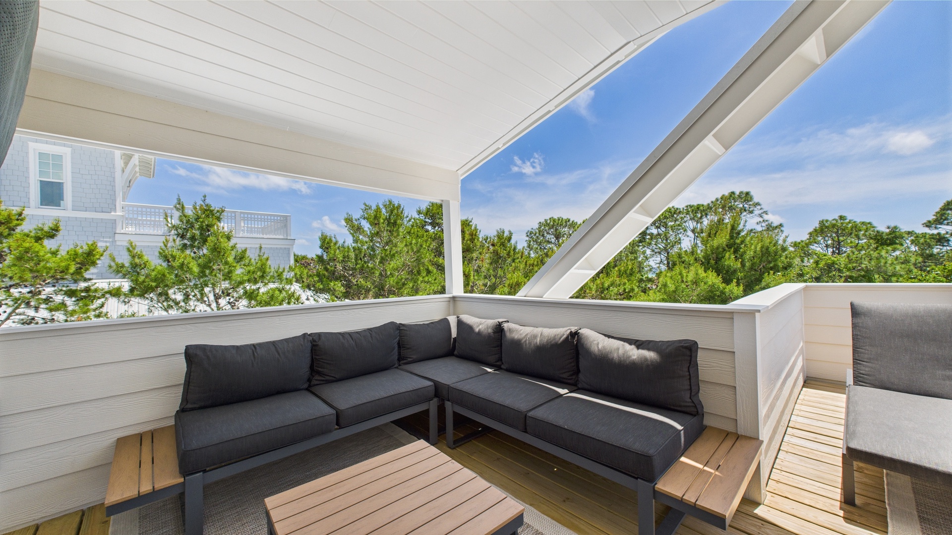 Third floor terrace with ample seating and hot tub