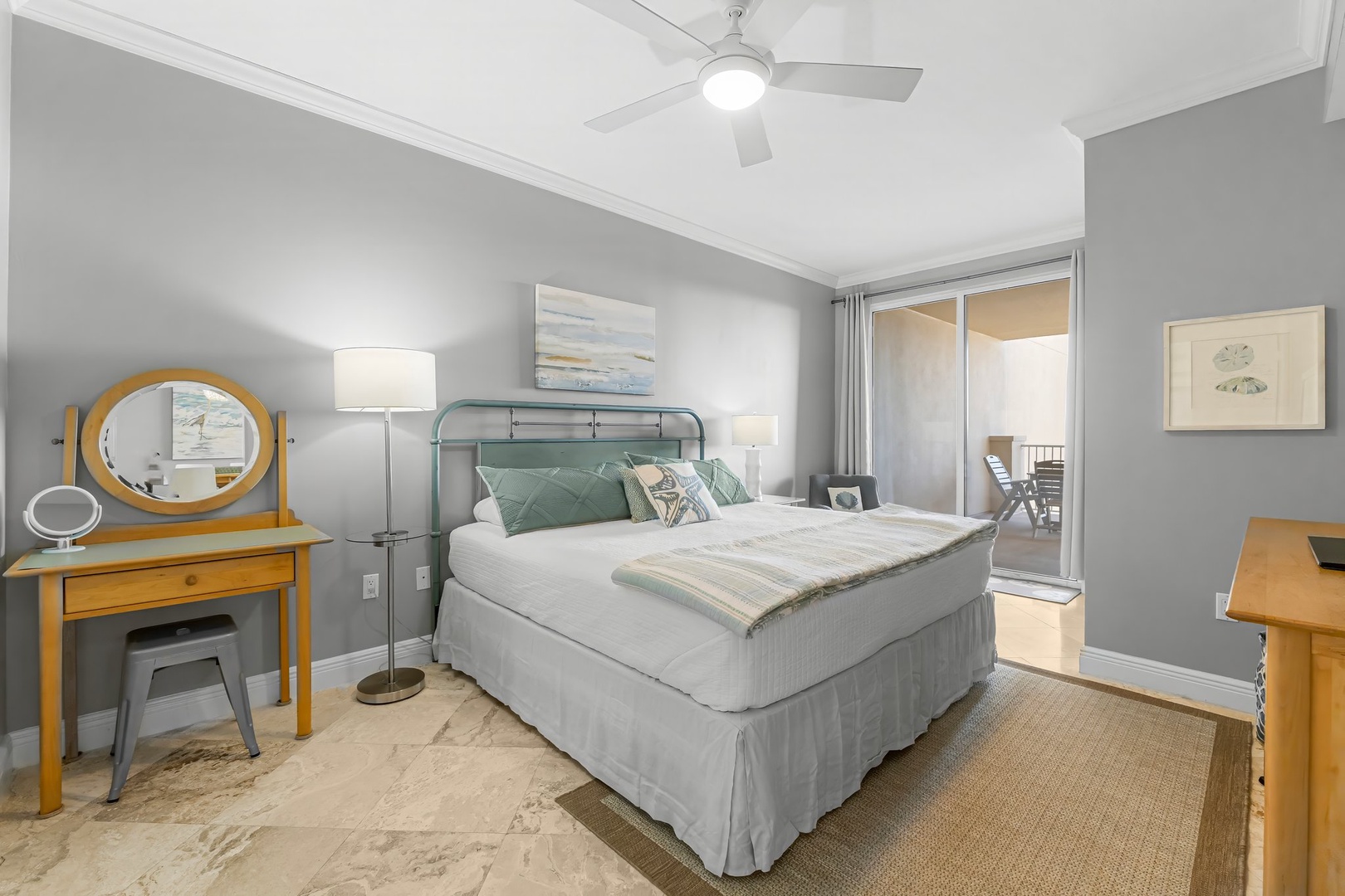 Primary bedroom with king bed and ensuite bathroom