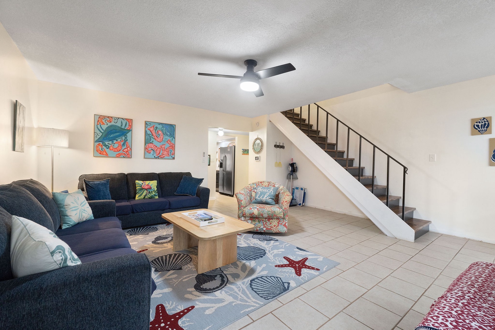 Open concept living area with TV