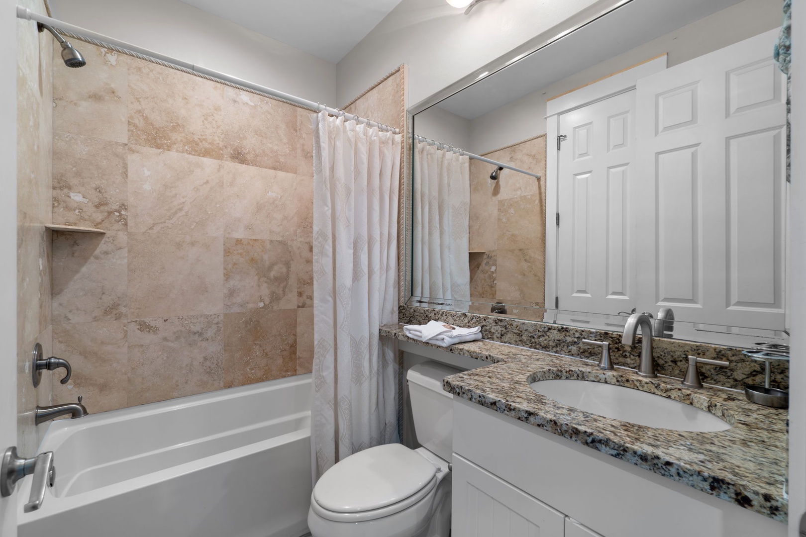2nd floor bathroom with a shower and tub