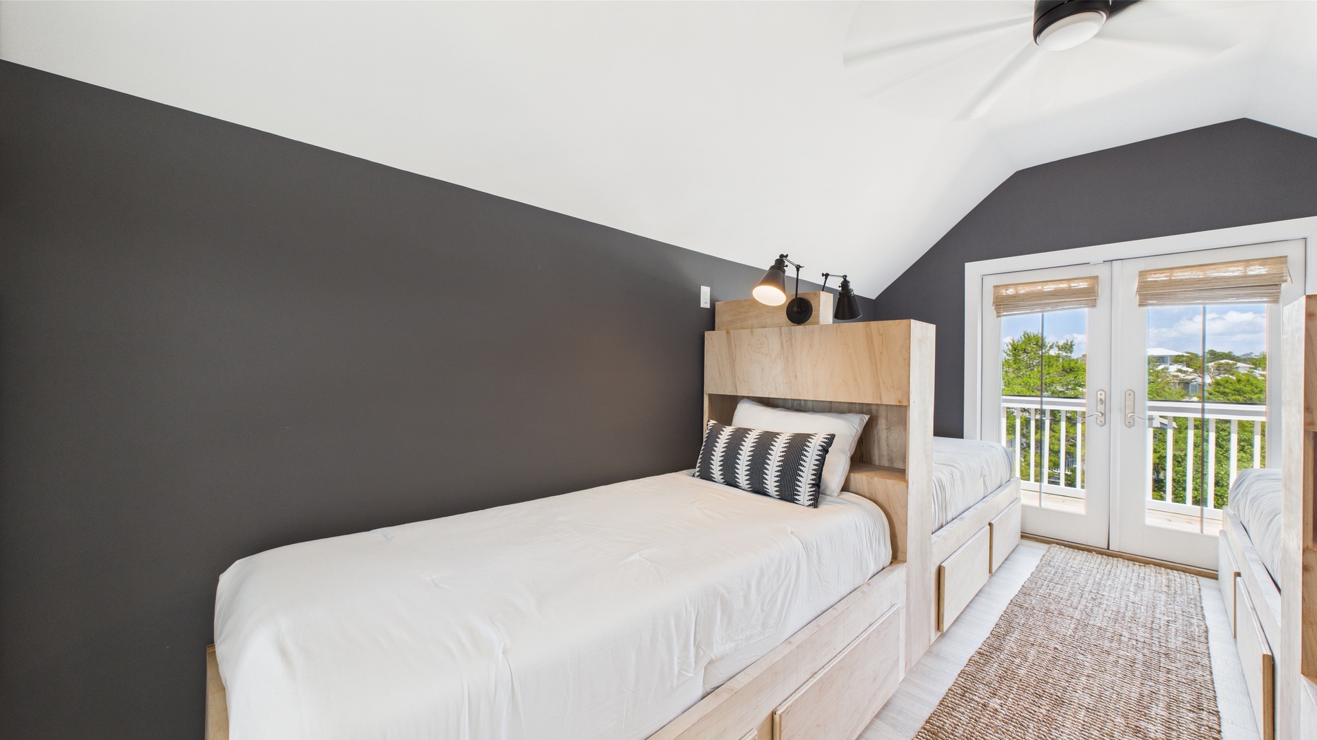 Fourth bedroom with four twin beds and balcony access