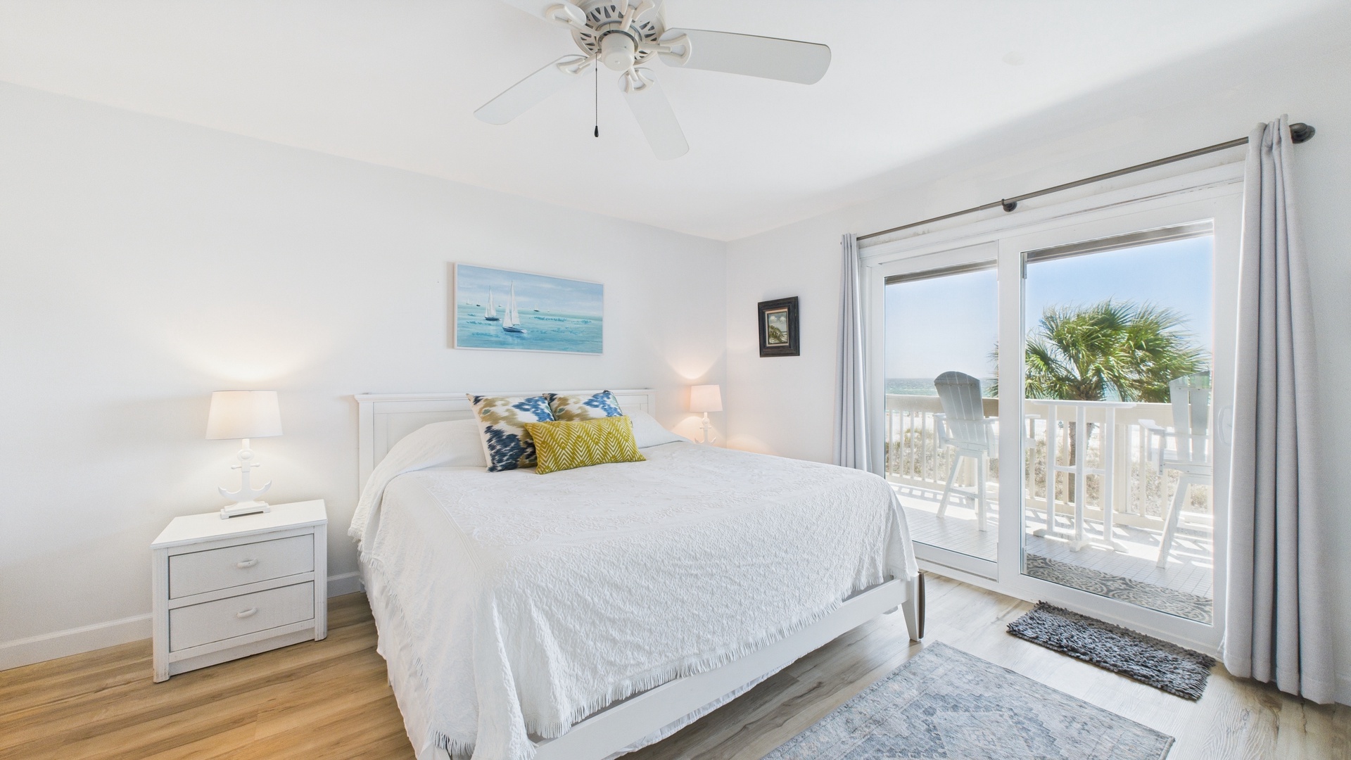 Master bedroom with king bed TV ensuite bathroom and balcony access