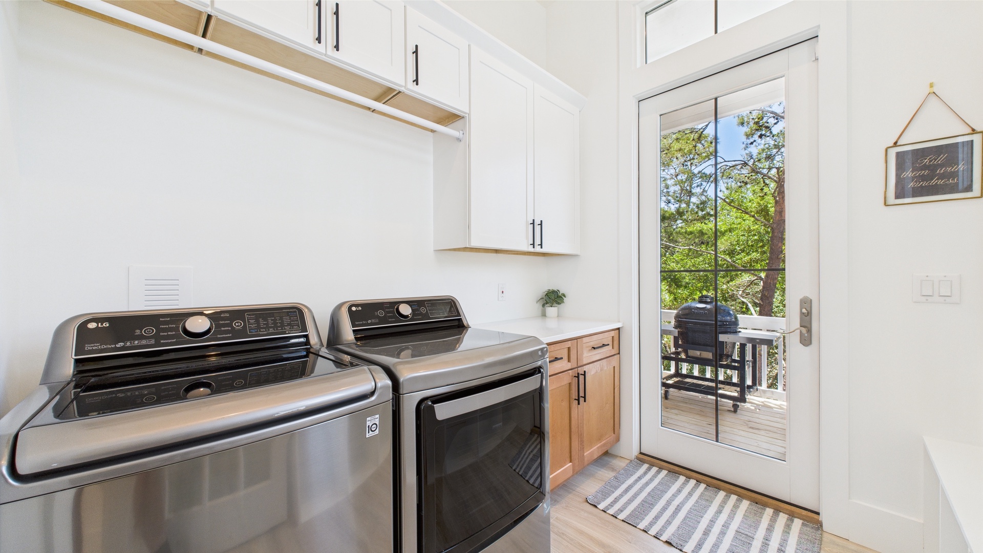 Laundry room with terrace access