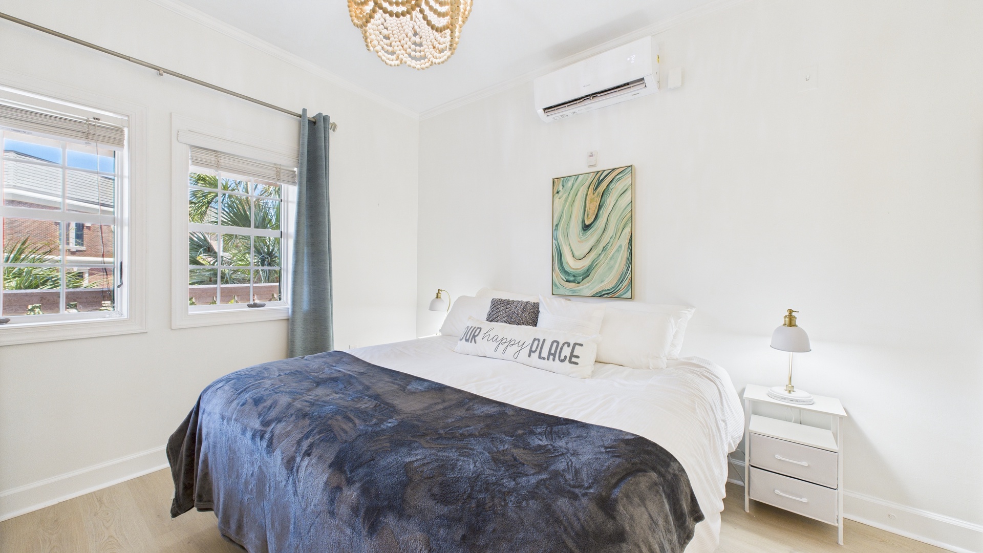 King bed and TV in living area (sleeps 2)