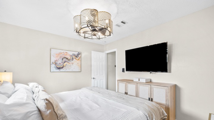 Primary bedroom with king bed