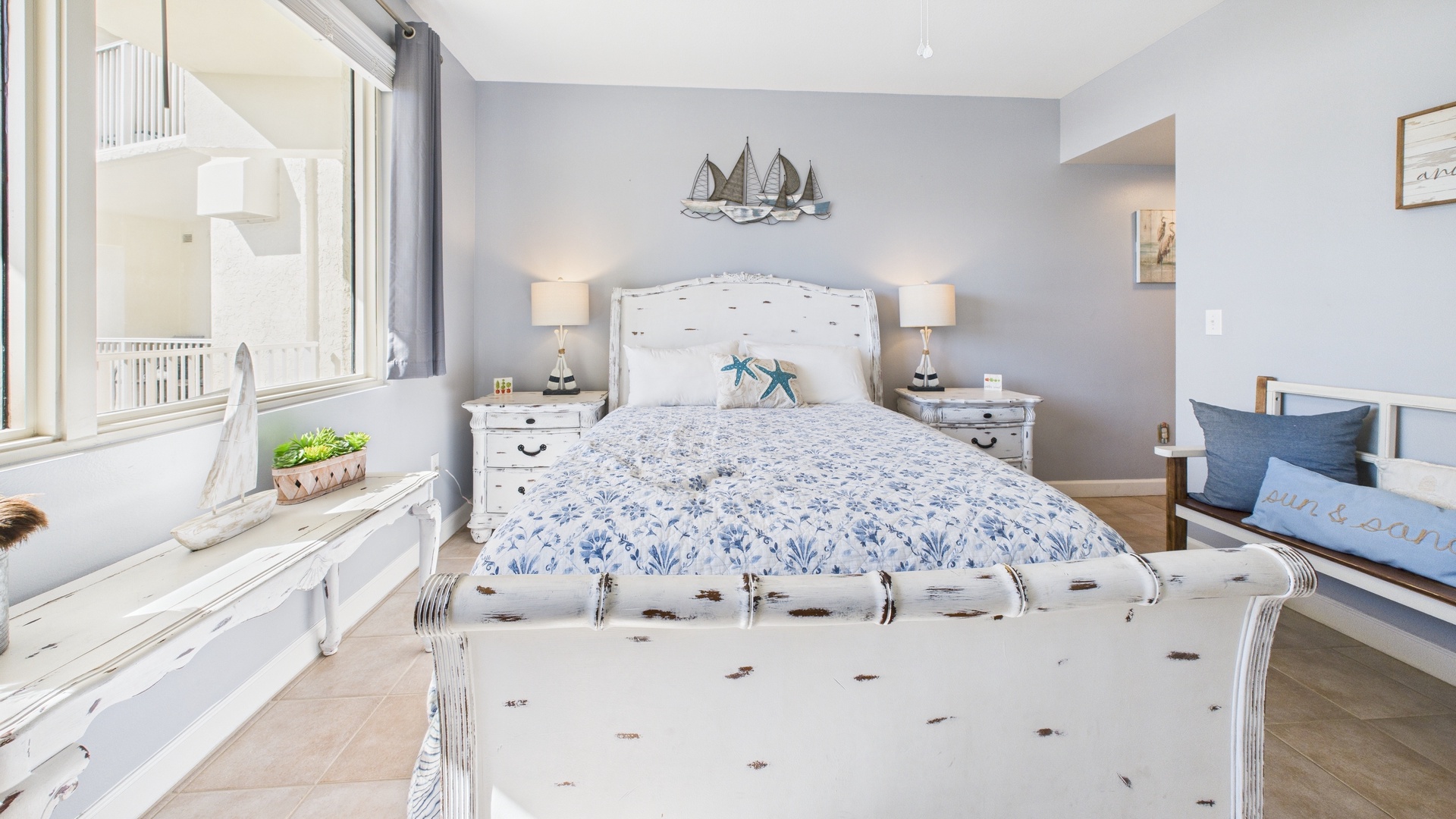 Master bedroom with queen bed TV and ensuite bathroom
