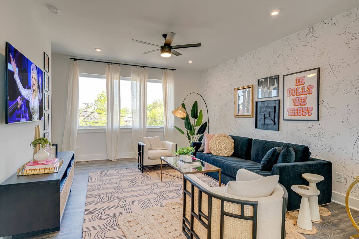 5629 - Bright and open living space complete with designer furnishings and smart TV.