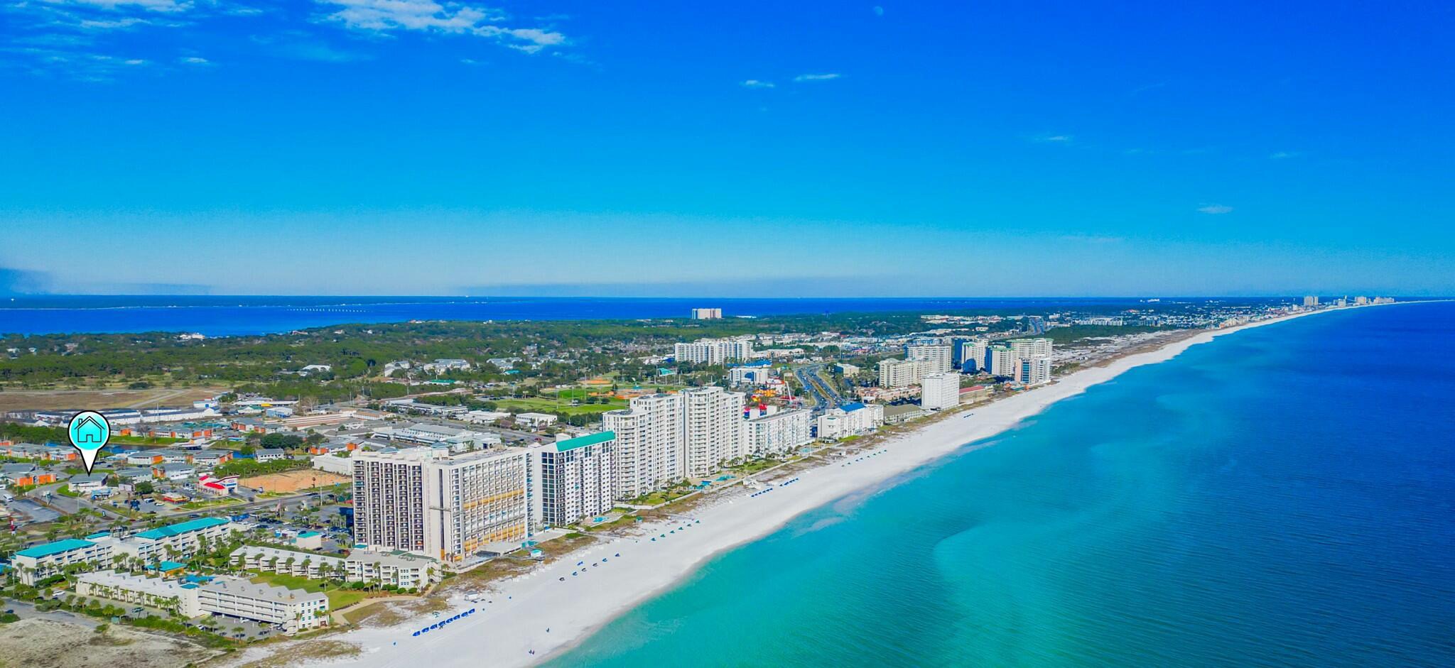 Coastal view of condos distance to beach