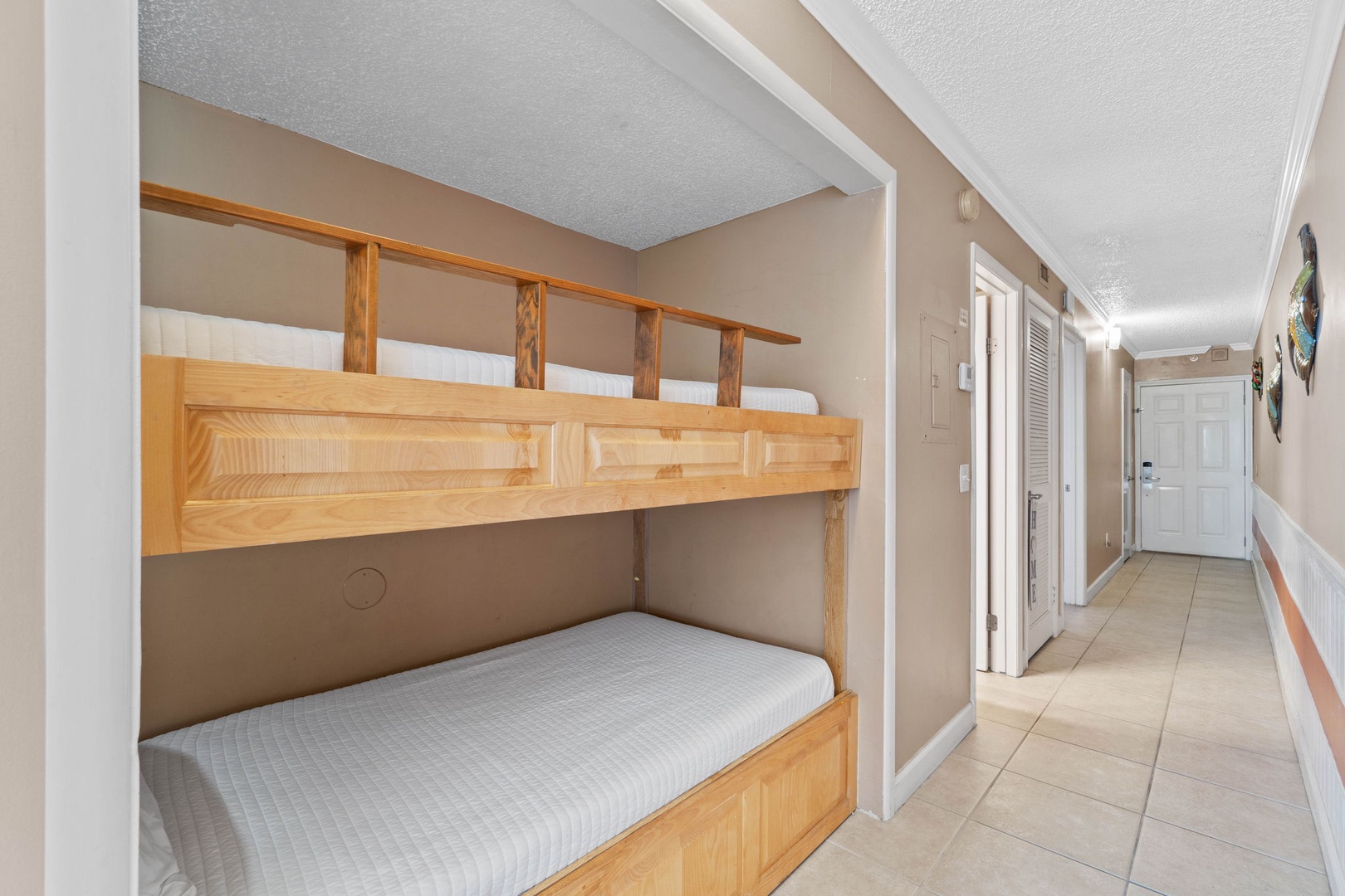 Twin bunk beds in the hallway
