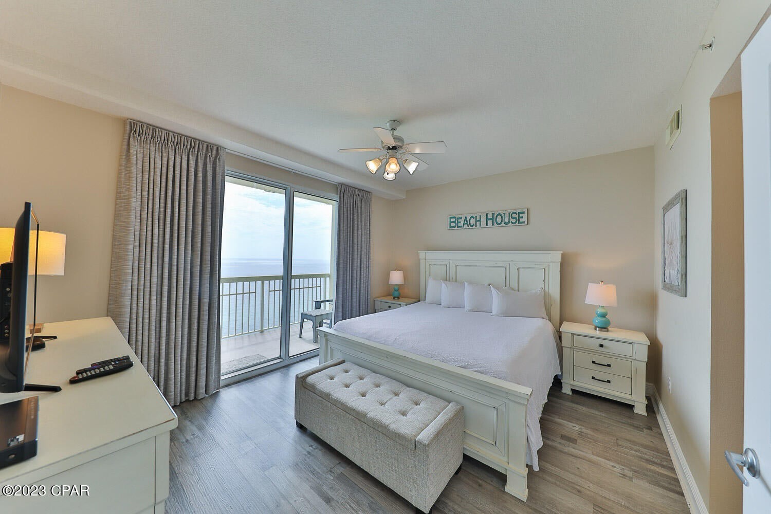 Primary bedroom with king bed and ensuite bathroom