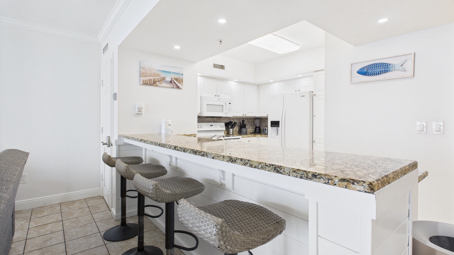 Breakfast bar with seating for 4 in kitchen