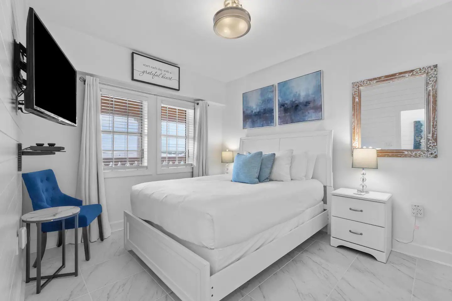 Second bedroom with queen bed TV