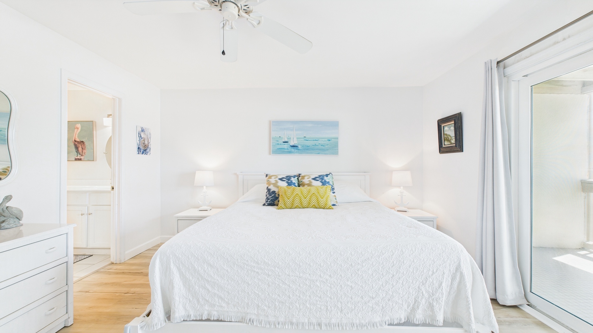 Master bedroom with king bed TV ensuite bathroom and balcony access