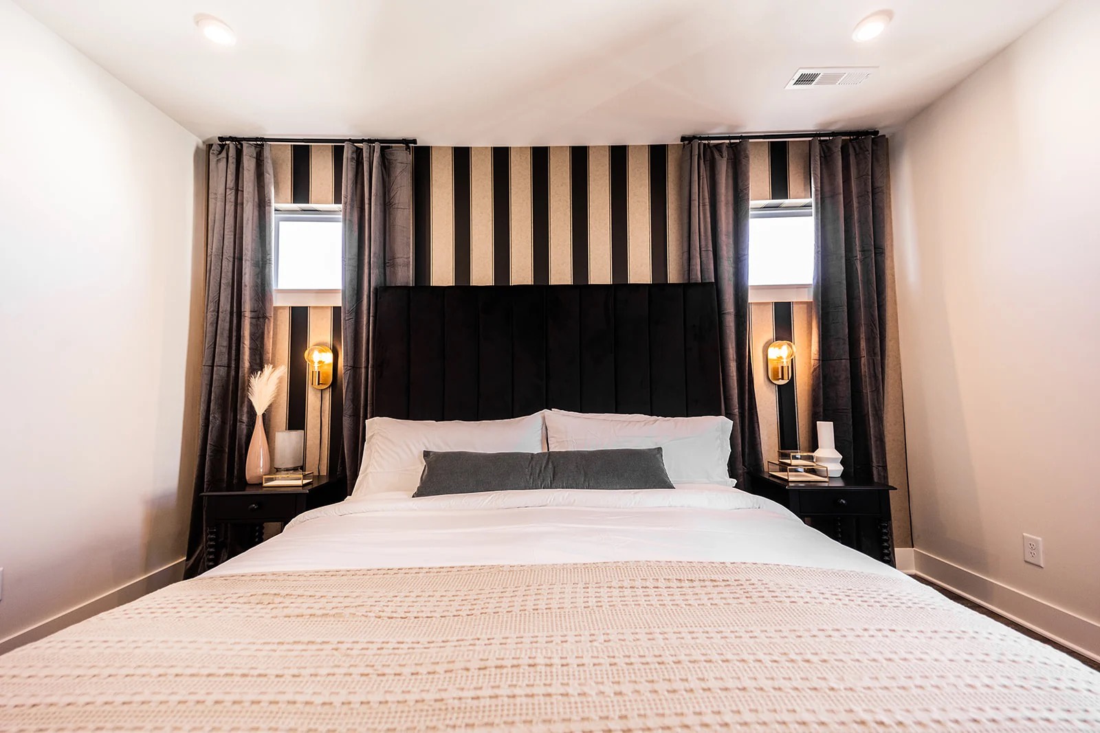 Master bedroom with king bed and ensuite bathroom