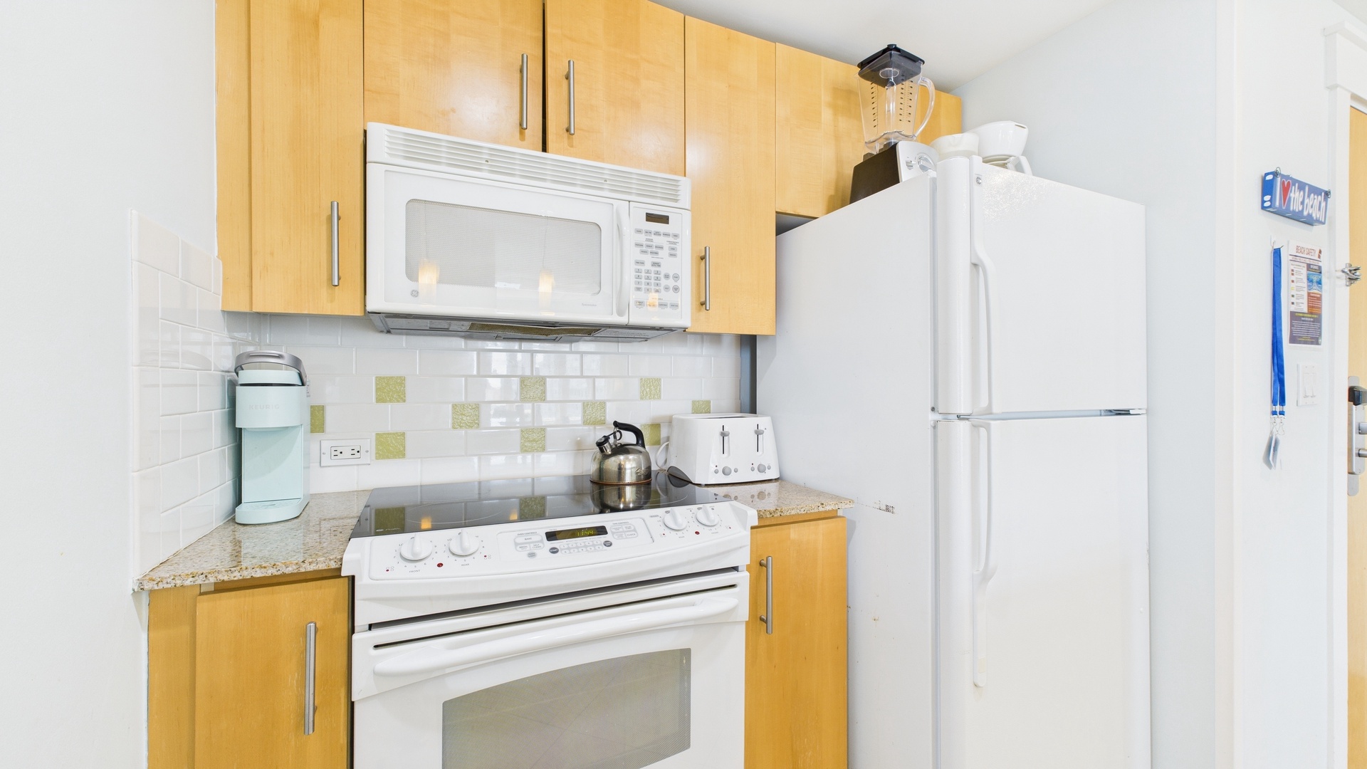 Full kitchen with necessary cooking essentials