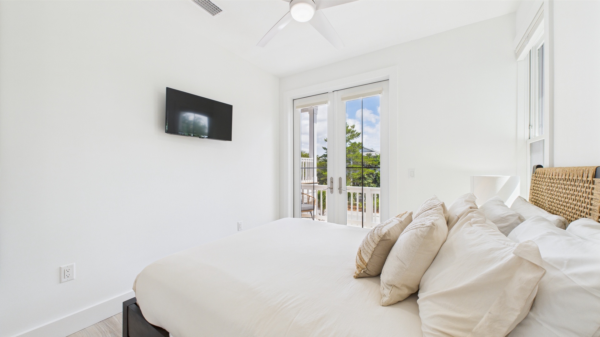 In Law suite above the garage-Bedroom with queen bed and balcony access