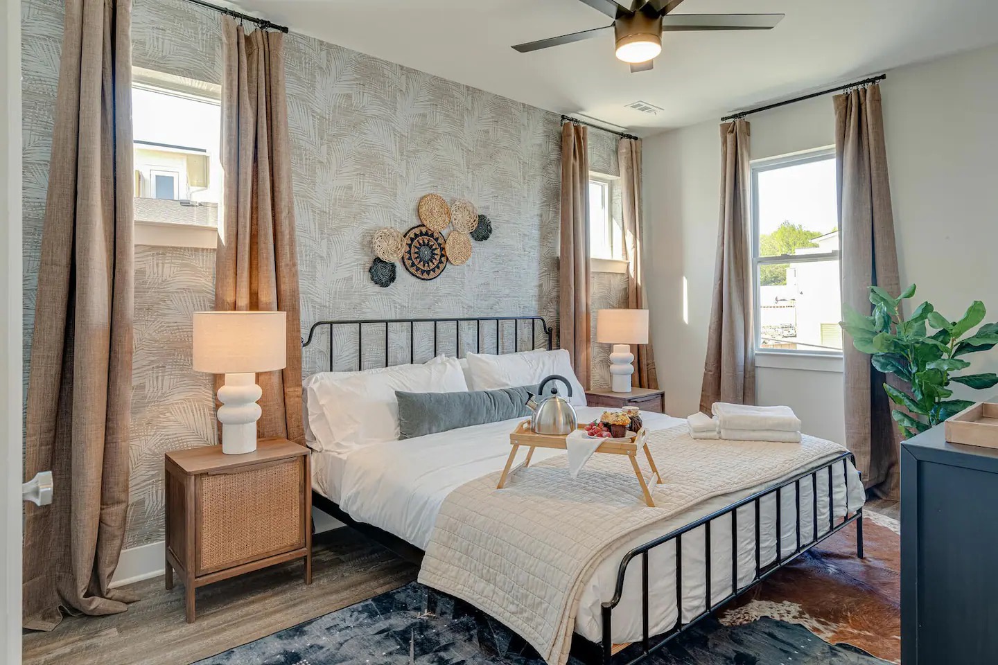 5631 - Primary Bedroom featuring a King bed, flat-screen SMART TV and designer furnishings with ensuite primary bathroom.