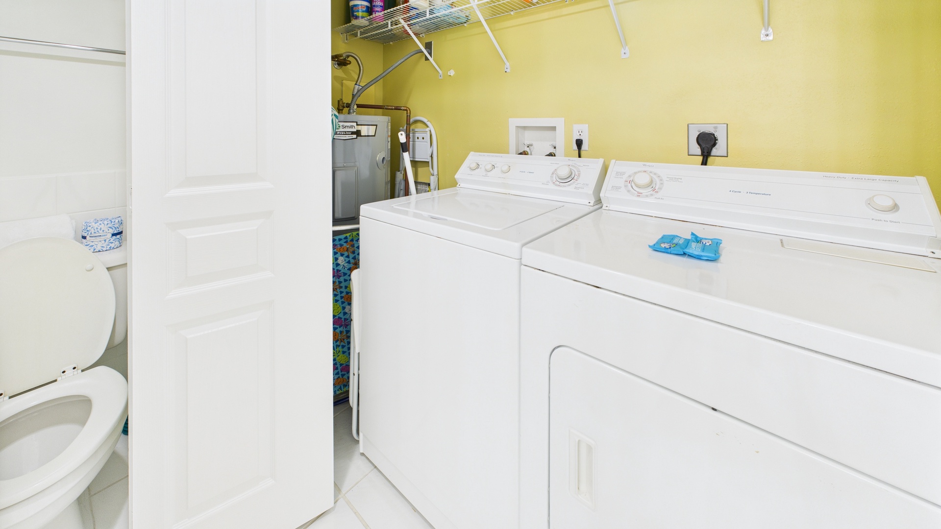 Washer and dryer machines in guest bathroom
