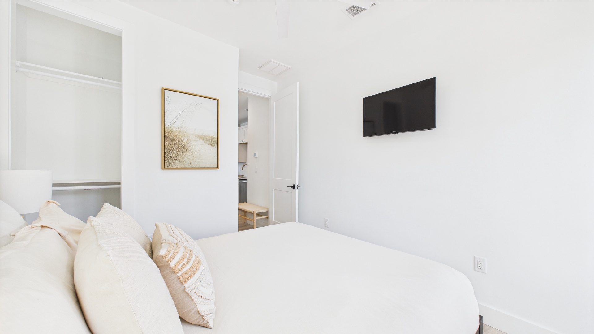 In Law suite above the garage-Bedroom with queen bed and balcony access