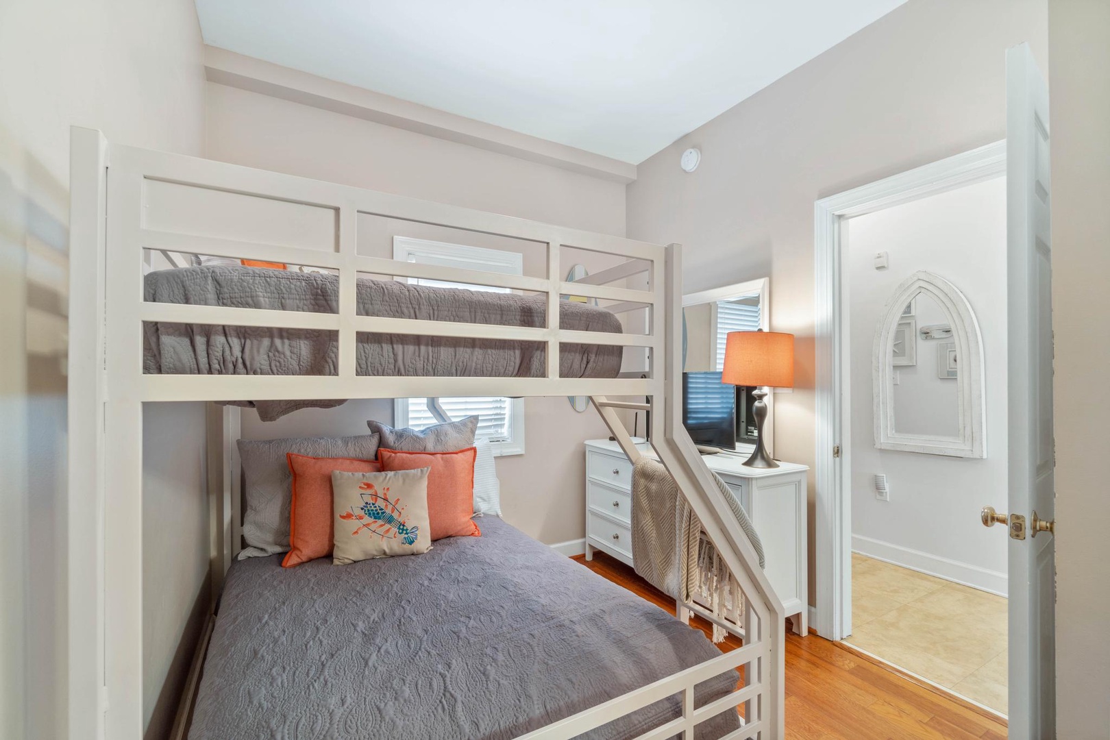 Twin-over-full bunk bed and a 32” TV
