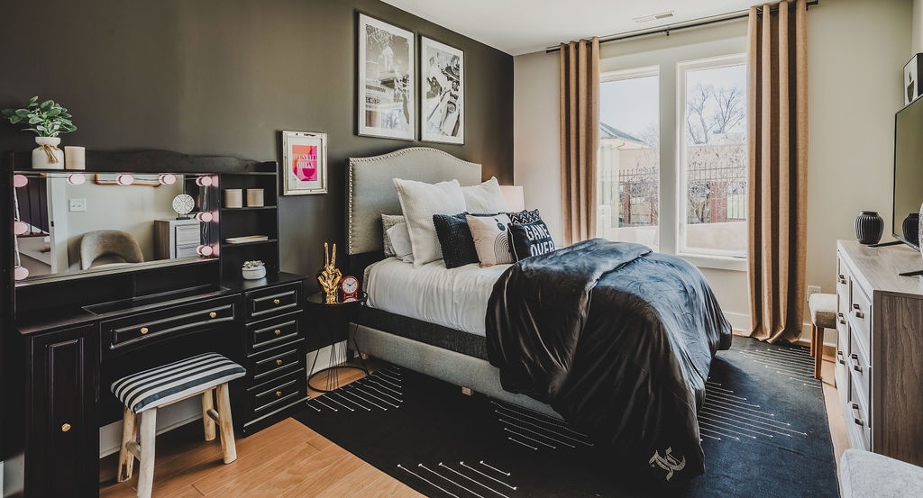 First bedroom with queen bed TV and ensuite bathroom