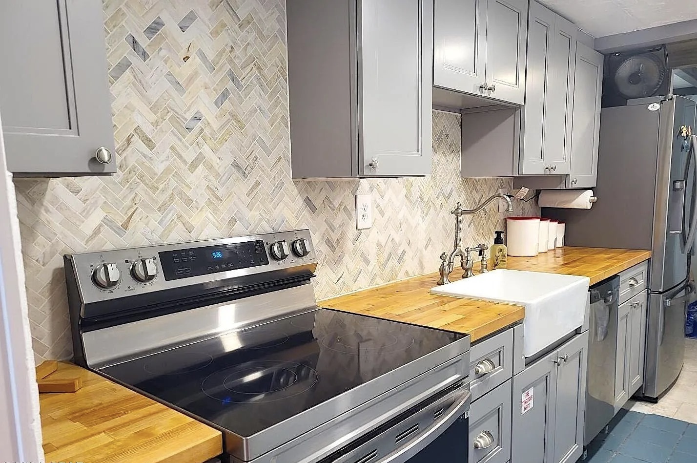 Full kitchen with updated appliances and cooking essentials