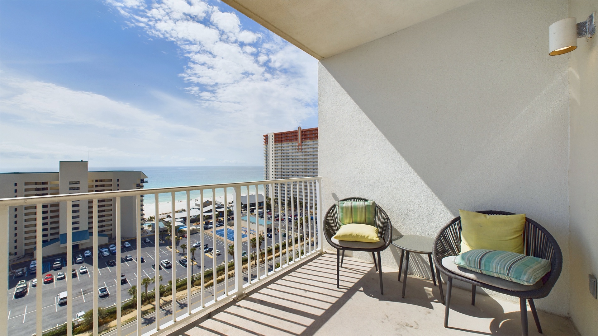 Private balcony with coastal views and ample seating