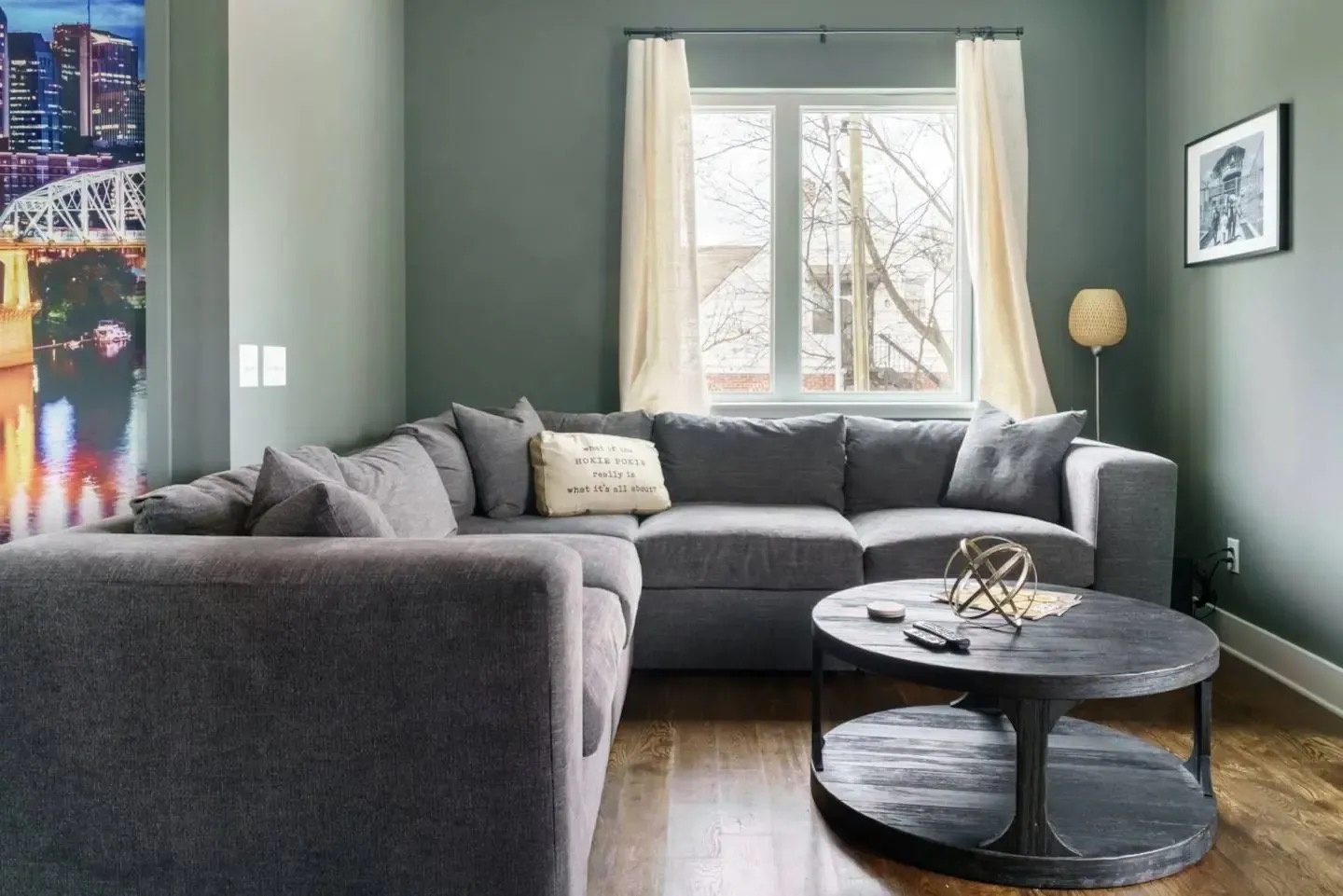Living area with stylish furnishings TV and sofa bed