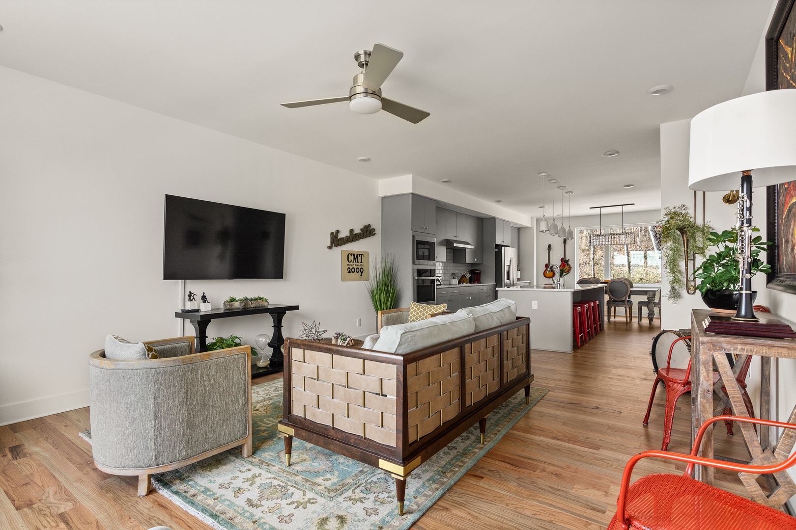 Living room area with Large Smart TV