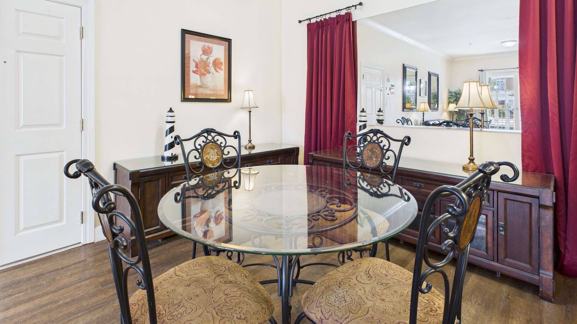 Dining table in main living area that seats 4