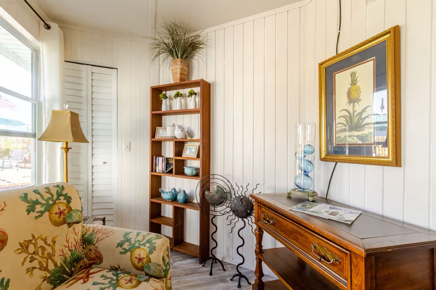 Sunroom with sleeper sofa and fireplace