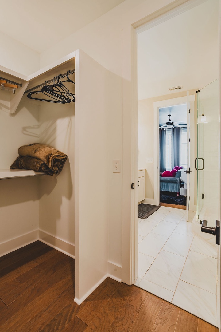 Primary bedroom walk-in closet