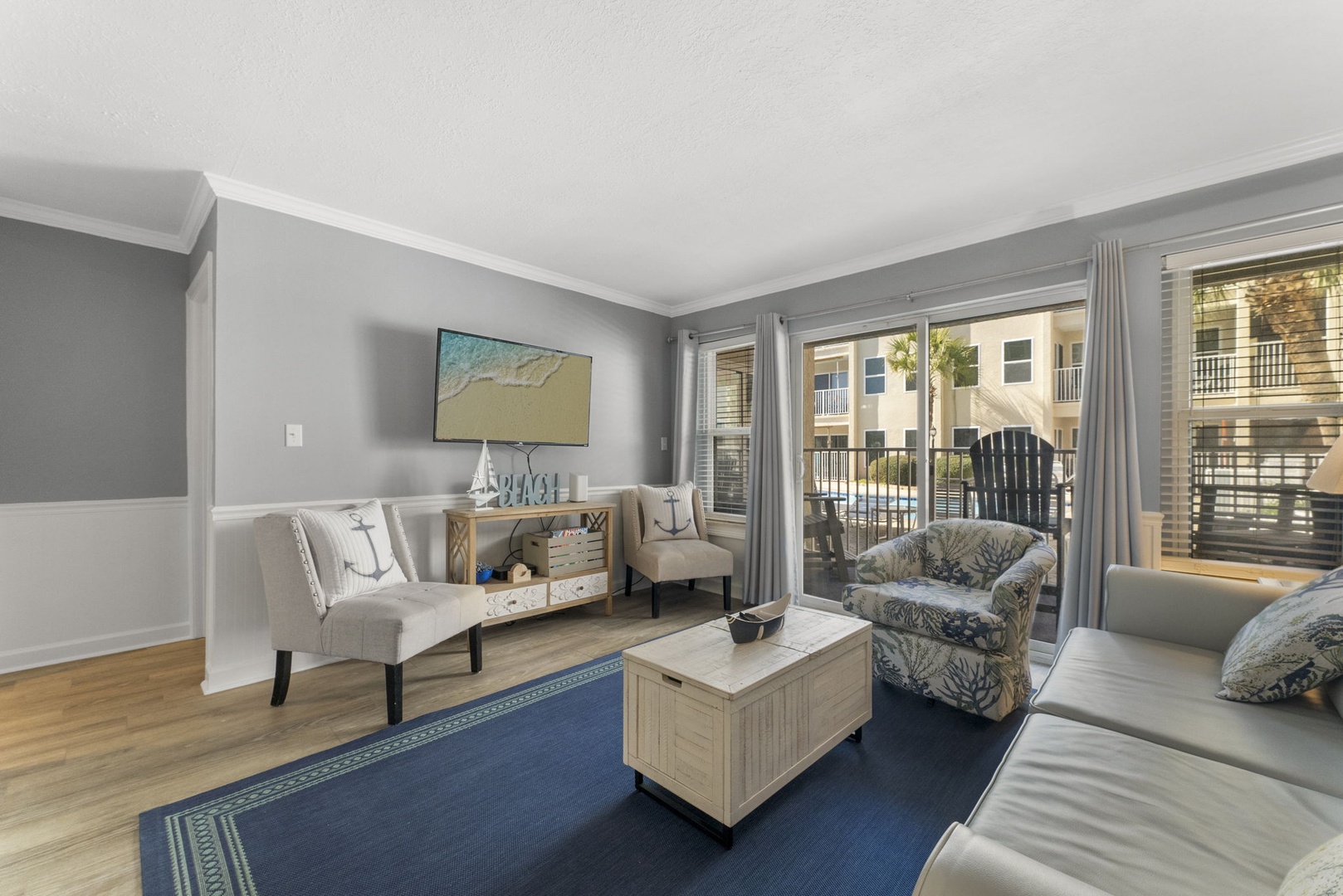 Living room with sleeper sofa & balcony access