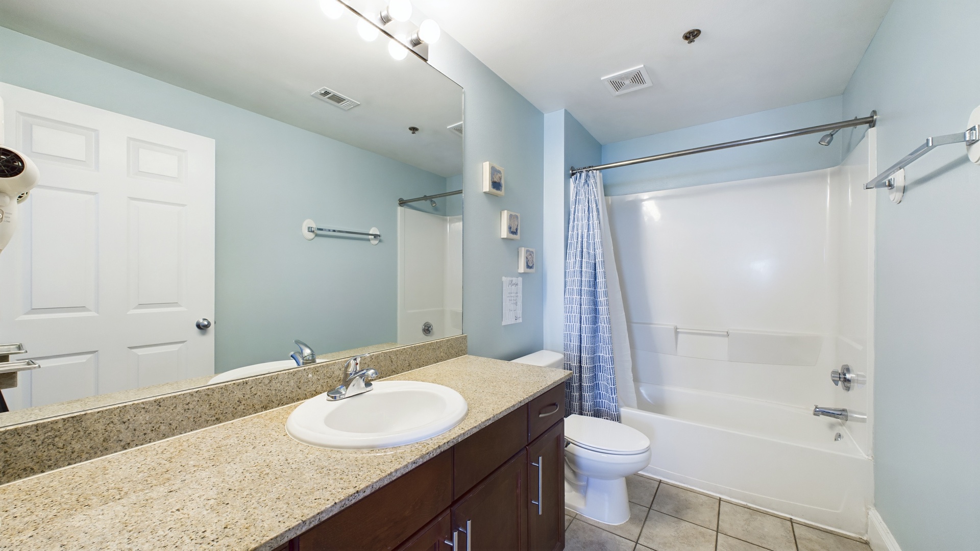Primary bathroom with shower and tub combo