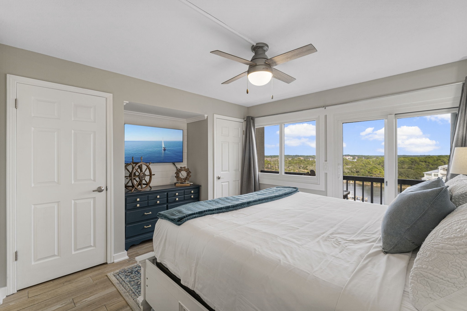 Master with king-sized bed & balcony access