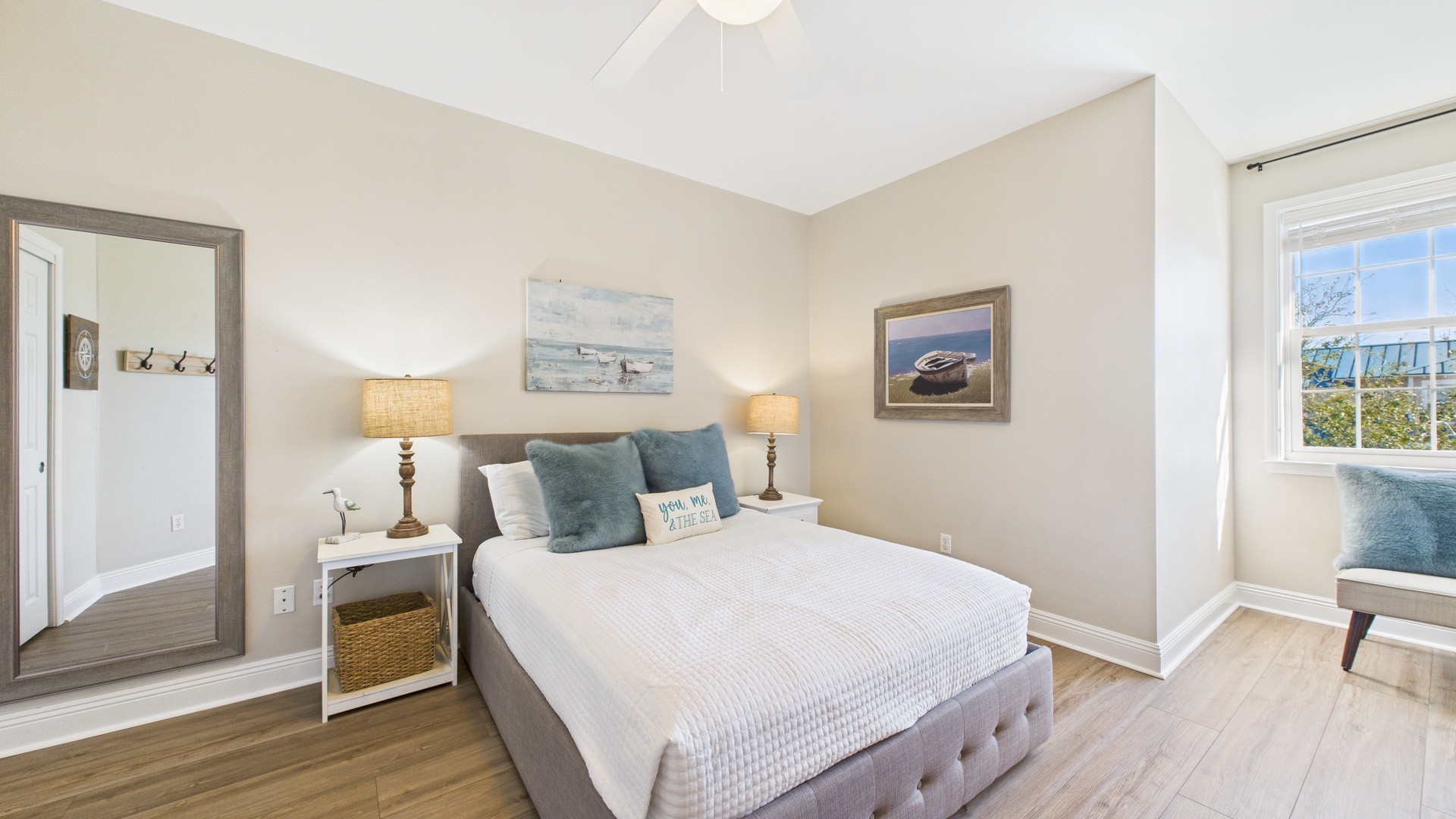 Bedroom with queen bed and TV