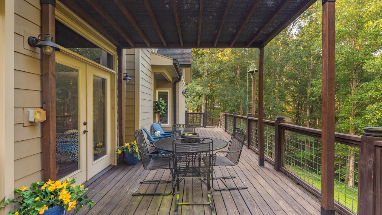Patio on the wrap around deck on the ground level