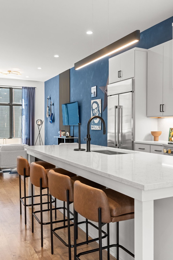 Kitchen area with kitchen island