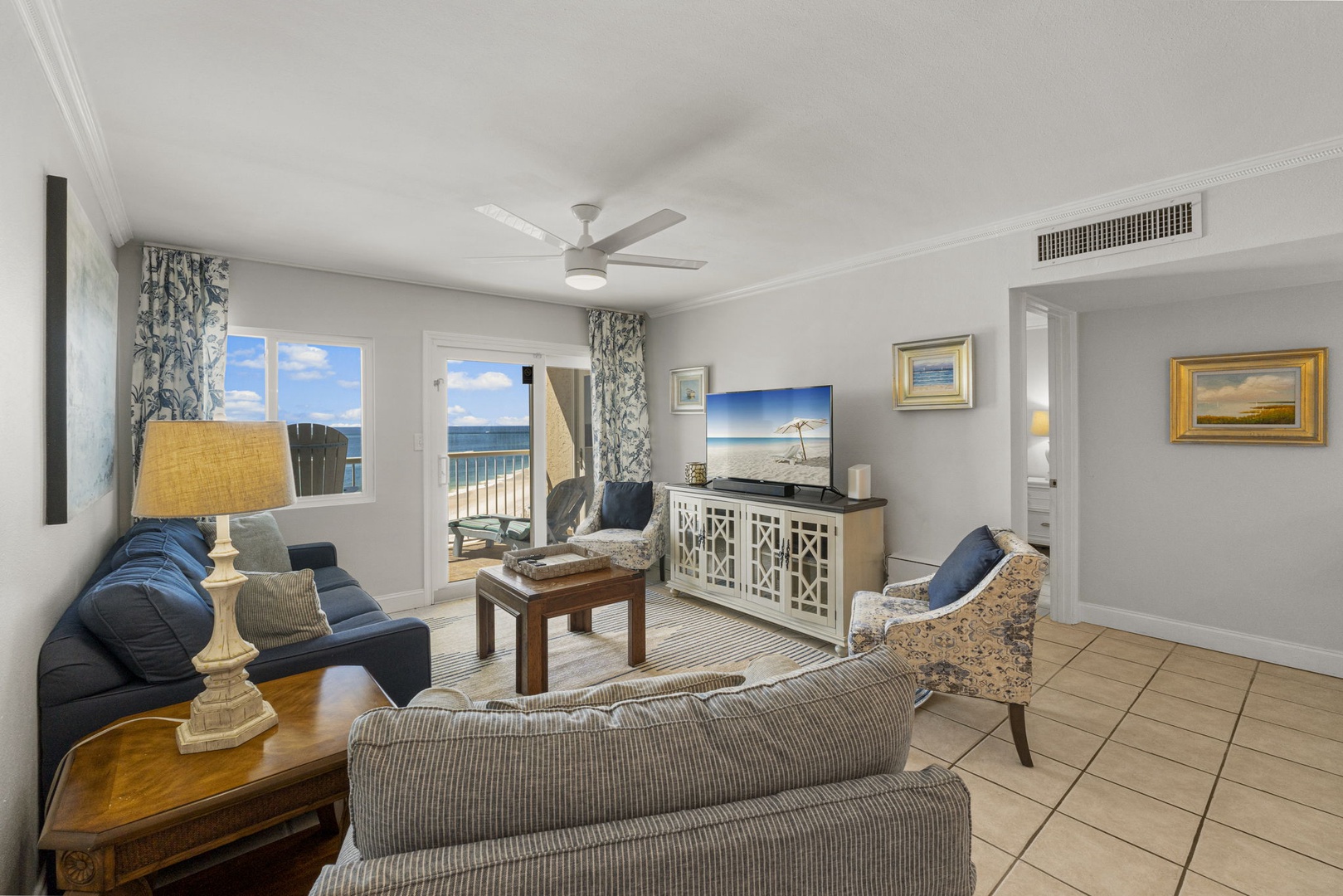Living room with sleeper sofa & balcony access