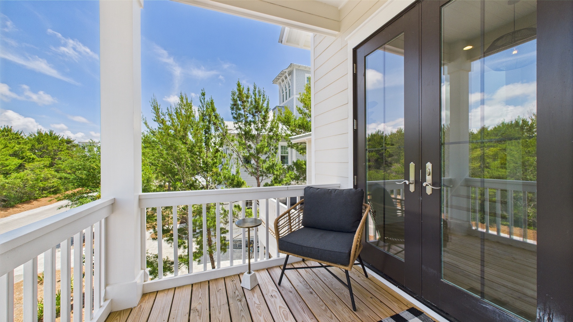 Second floor wraparound balcony with scenic views and seating