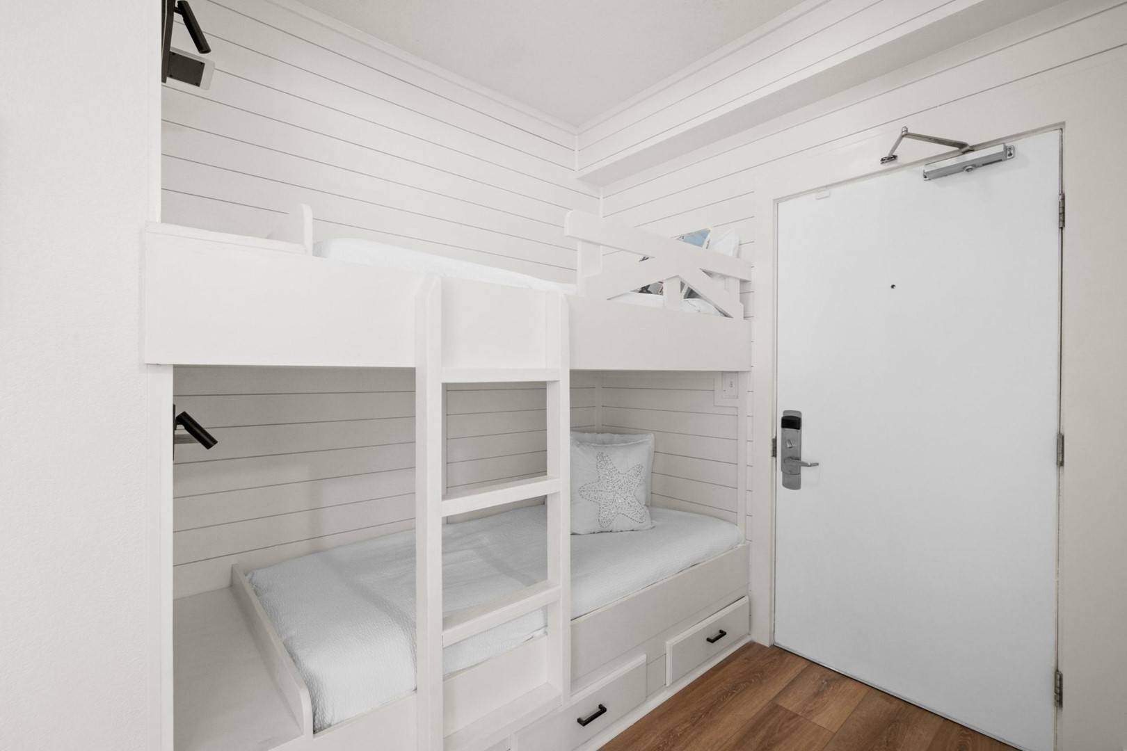 Bunk nook in hallway with twin-over-twin bunk