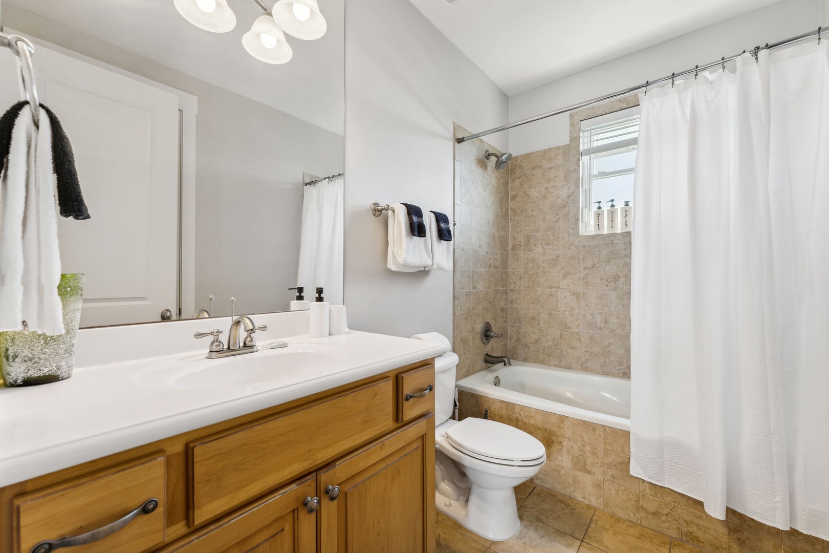 3rd bathroom on the 2nd floor with tub and shower combination