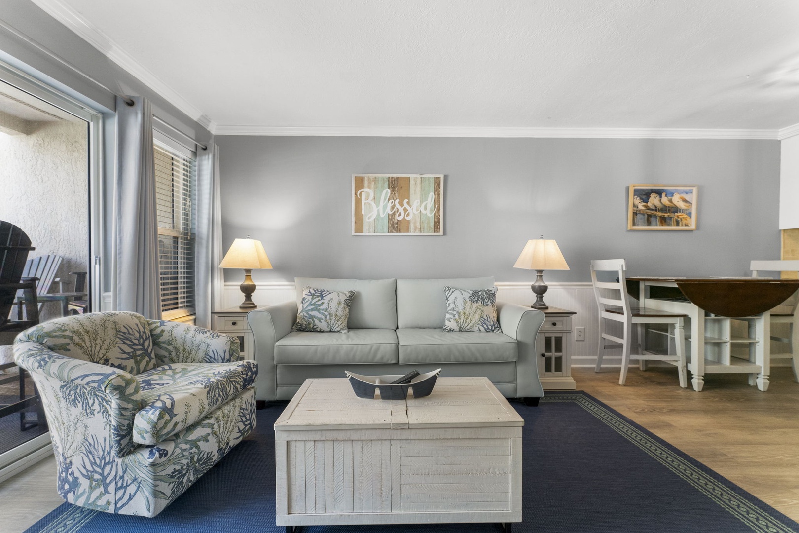 Living room with sleeper sofa & balcony access