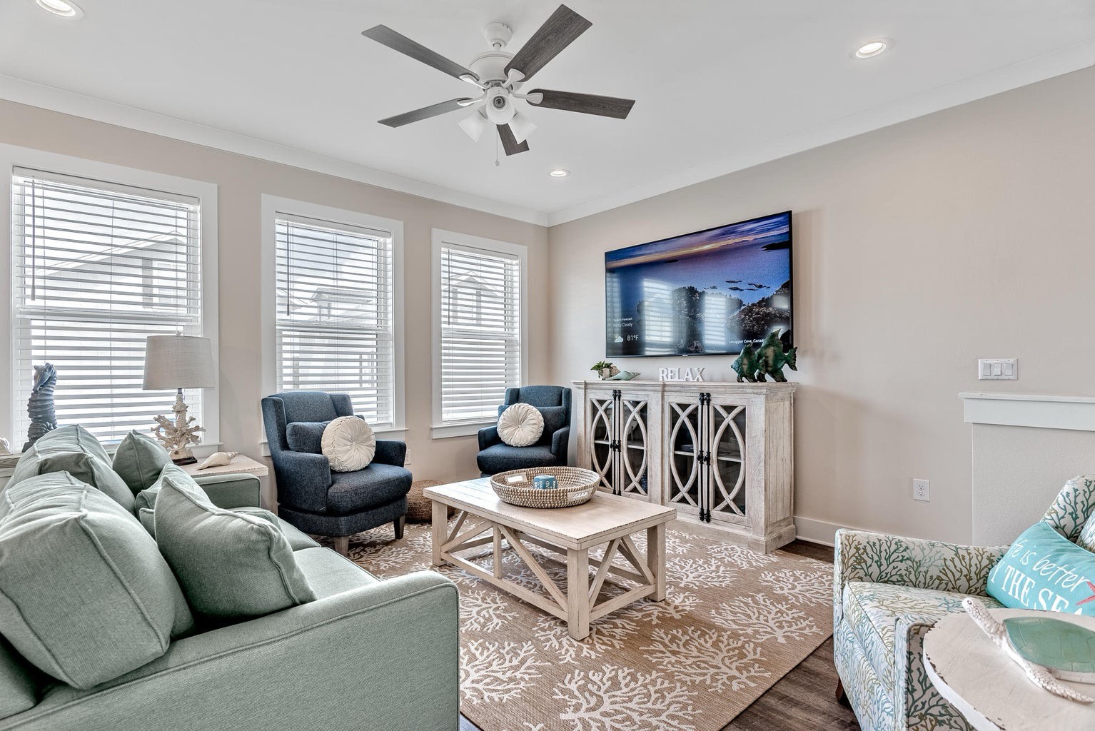 Living room with stylish furnishings TV and pull out sofa