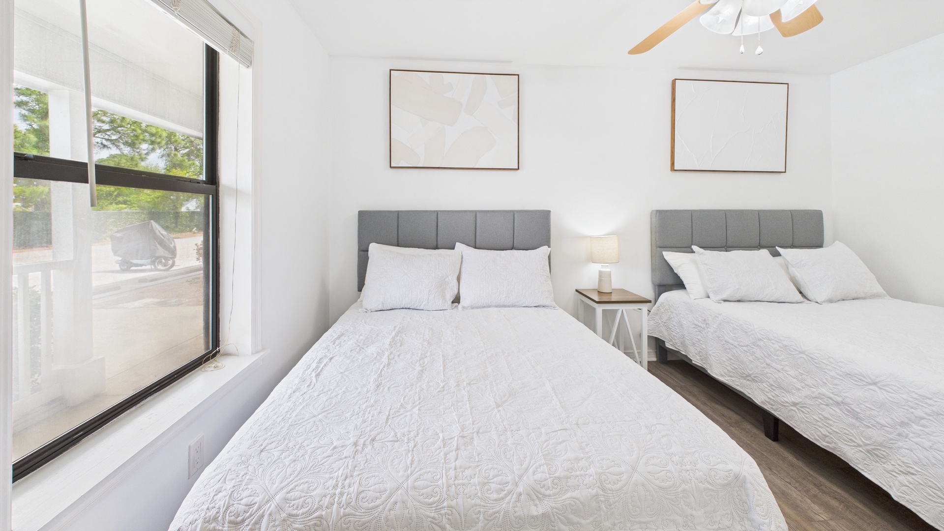 Guest bedroom with two full beds and ensuite